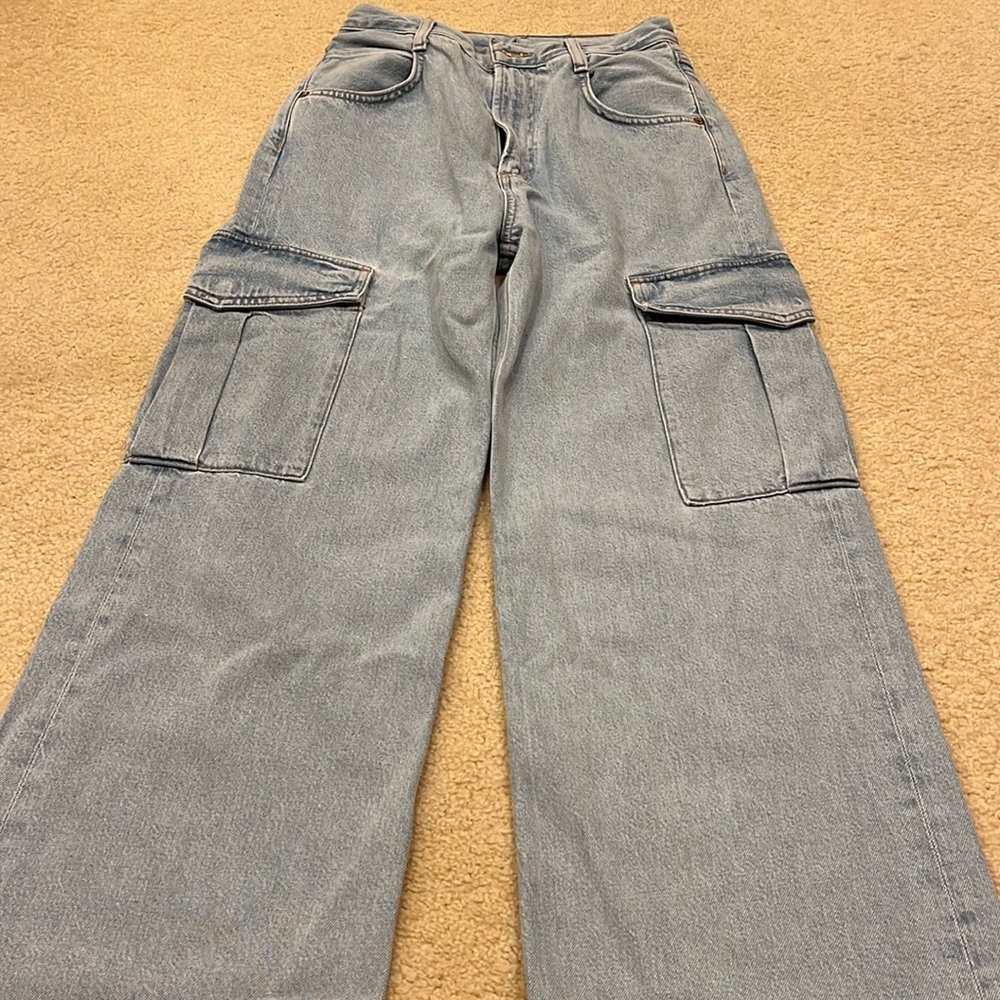 A Golde. Minka style. Size 25. Wide leg. Side cargo type pockets on each leg.